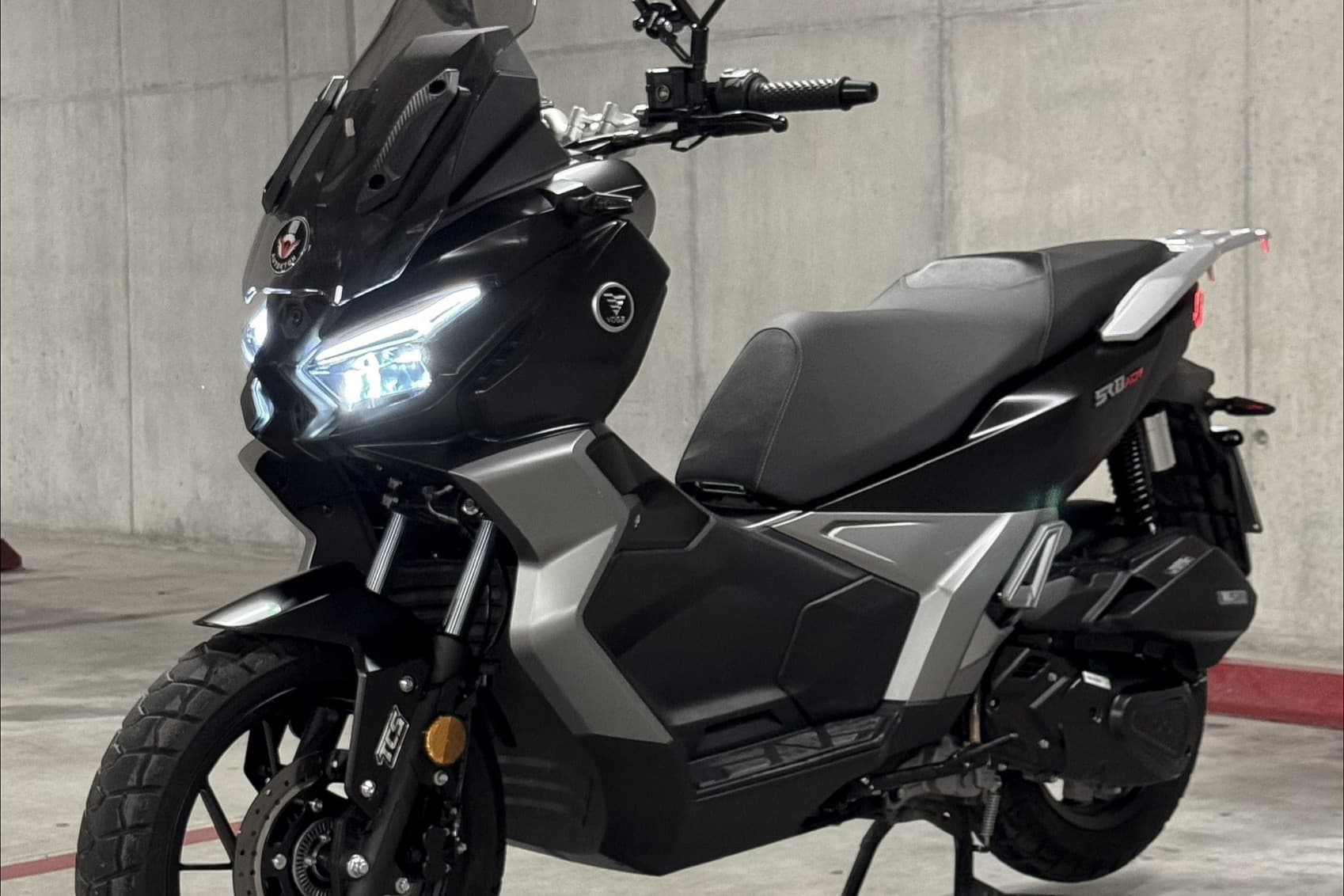 Voge SR1 ADV 125 parked indoors